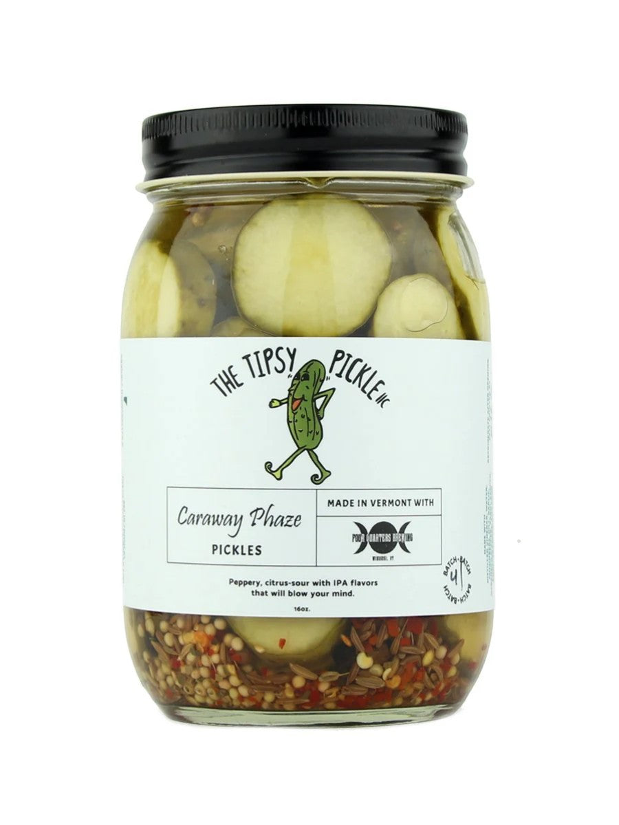 Stowe Public House & Bottle Shop Tipsy Pickle Caraway Phaze pickles in a jar with IPA flavors, caraway seeds, and chili flakes.