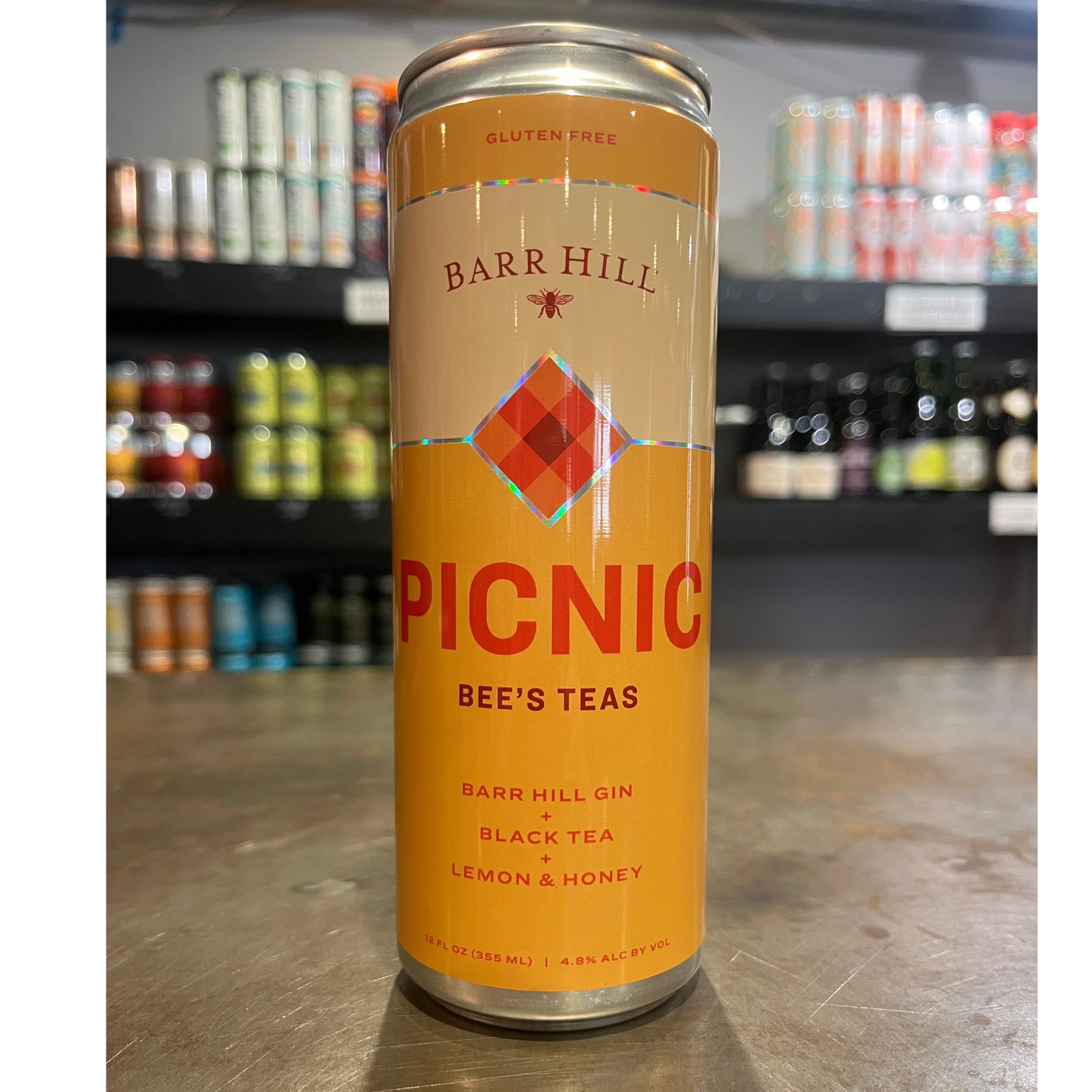 Stowe Public House & Bottle Shop Barr Hill Bee's Teas Picnic canned cocktail with gin, black tea, lemon, and honey. Gluten-free.