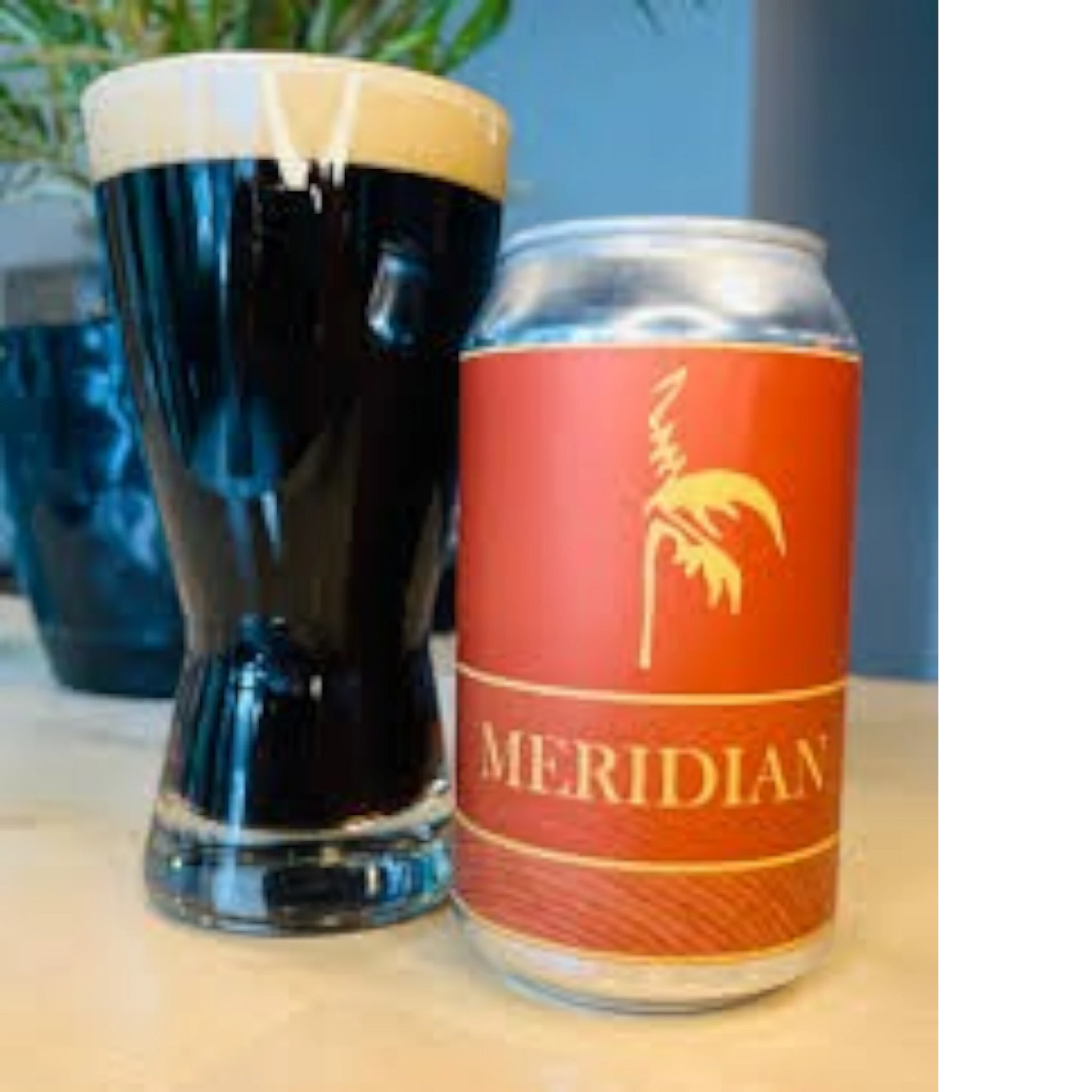Stowe Public House & Bottle Shop Meridian Porter beer can next to a glass of dark porter with a thick tan head.
