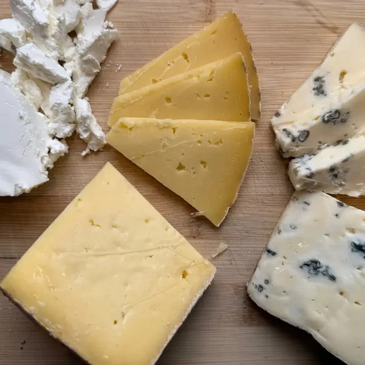Stowe Public House & Bottle Shop Blue Ledge Riley's 2x4 mixed milk cheese slices on a wooden board