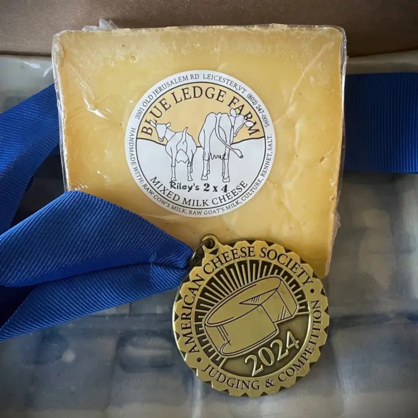 Stowe Public House & Bottle Shop Blue Ledge Riley's 2x4 mixed milk cheese wedge with a 2024 American Cheese Society medal