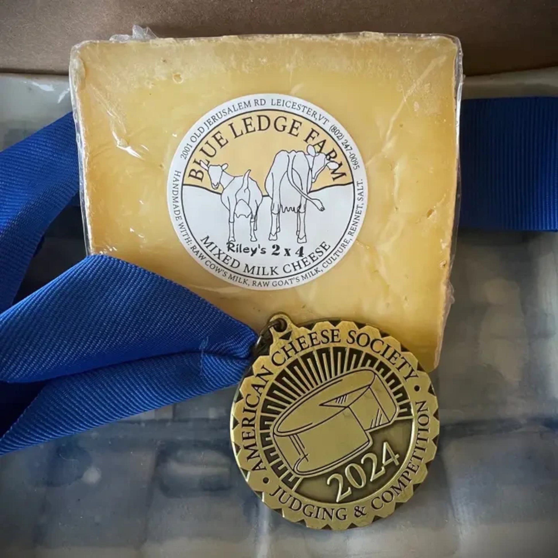 Stowe Public House & Bottle Shop Blue Ledge Riley's 2x4 mixed milk cheese wedge with a 2024 American Cheese Society medal