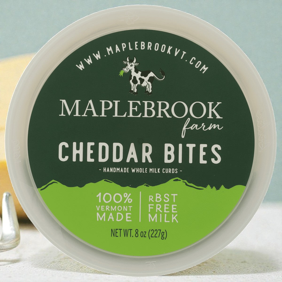Stowe Public House & Bottle Shop Maplebrook Farm Cheddar Bites, 8oz container of handmade whole milk cheese curds, 100% Vermont made, RBST free milk.