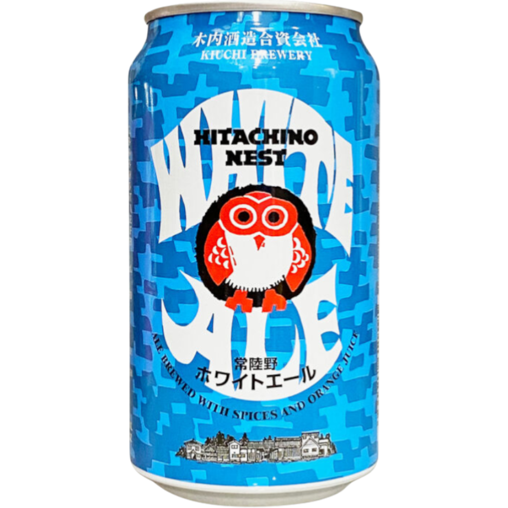 Stowe Public House & Bottle Shop Hitachino Nest White Ale can with blue pixelated design and owl logo. Brewed with spices and orange juice.