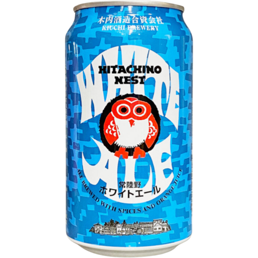 Stowe Public House & Bottle Shop Hitachino Nest White Ale can with blue pixelated design and owl logo. Brewed with spices and orange juice.