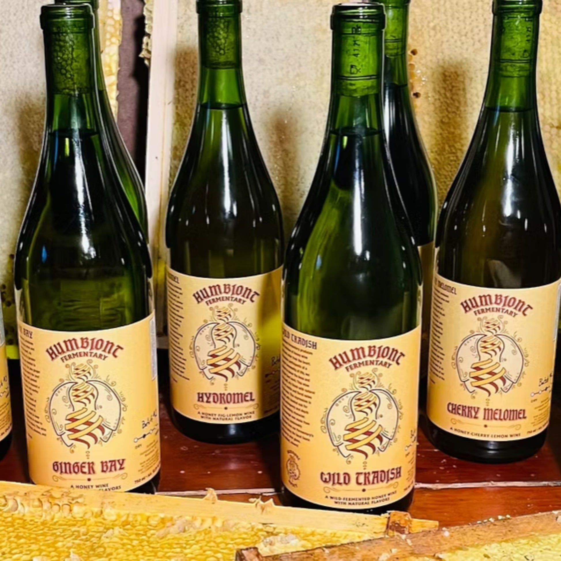 Stowe Public House & Bottle Shop Humbiont Dry Table Melomel honey wine in green glass bottles with cream labels.