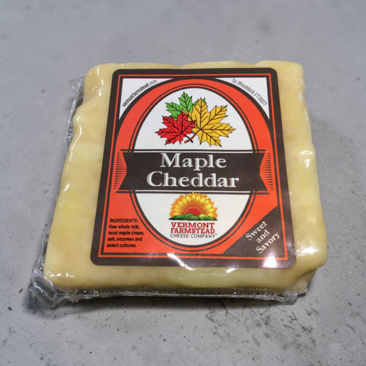 Stowe Public House & Bottle Shop Vermont Farmstead Maple Cheddar cheese, aged, creamy texture, made with raw whole milk and maple cream.