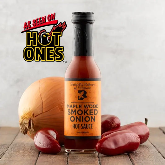 Stowe Public House & Bottle Shop Maple Wood Smoked Onion Hot Sauce, medium heat, with red jalapeños and onion.