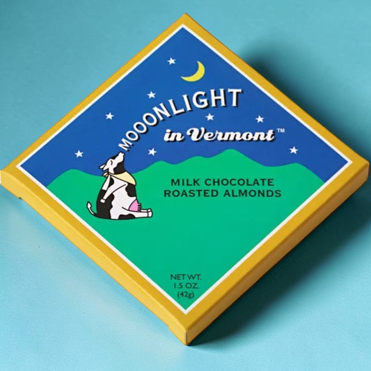 Stowe Public House & Bottle Shop Moonlight in Vermont milk chocolate roasted almond bar. Features a cow looking at the moon.