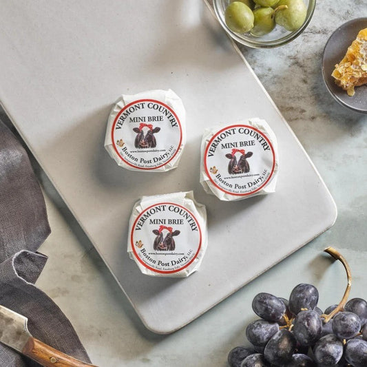 Stowe Public House & Bottle Shop Vermont Country Mini Brie cheese, creamy and mild, perfect for appetizers.
