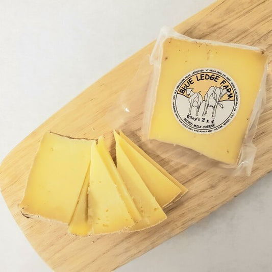 Stowe Public House & Bottle Shop's Blue Ledge Farm Riley's 2x4 mixed milk cheese, cave-aged with a natural rind.