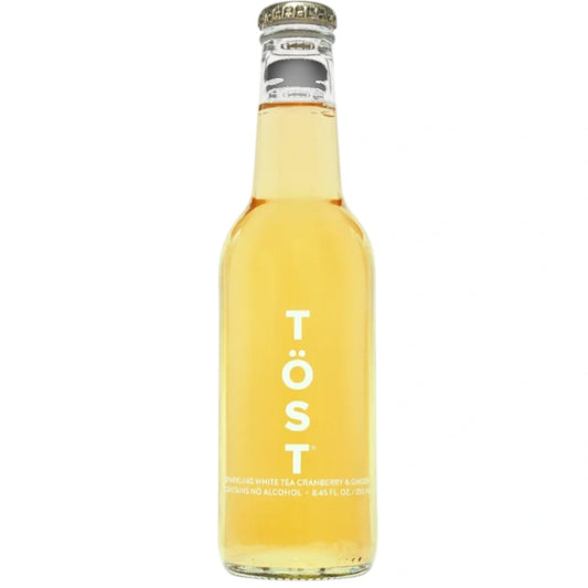 Stowe Public House & Bottle Shop Töst sparkling beverage in a clear glass bottle. White tea, cranberry, and ginger flavor.