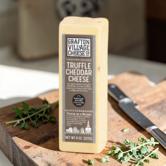 Stowe Public House & Bottle Shop Grafton Village Truffle Cheddar cheese, semi-firm, creamy texture with sweet, buttery, and earthy truffle flavors.