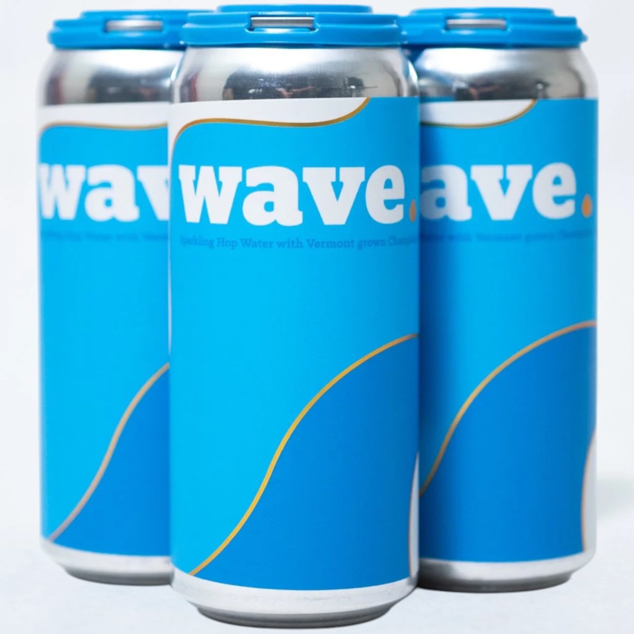 Stowe Public House & Bottle Shop Wave sparkling hop water cans, zero alcohol, zero calories, zero sugar. Blue cans with orange wave design.