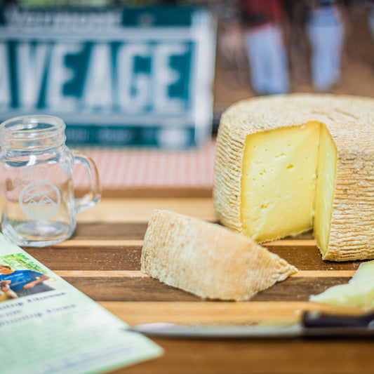 Stowe Public House & Bottle Shop's Mount Mansfield Creamery Halfpipe cheese, a French Alpine style aged five months, with a pale yellow interior and rind.
